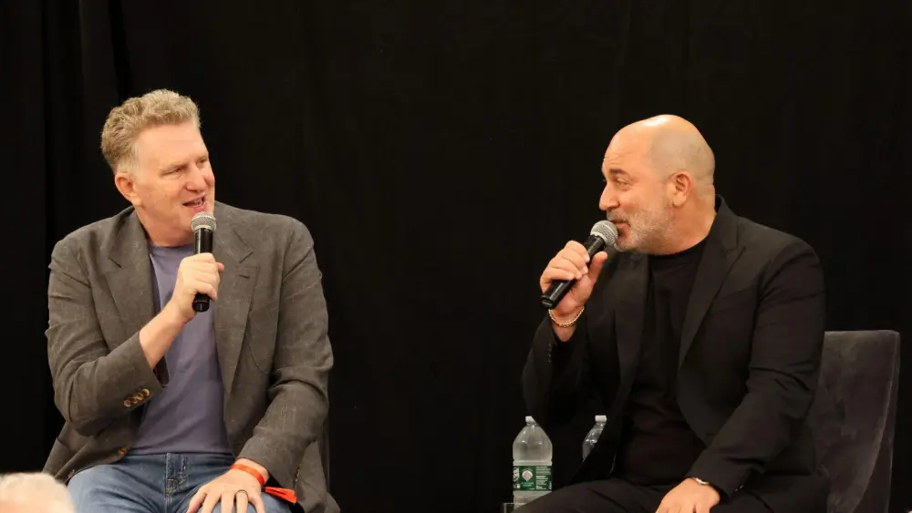 Michael Rapaport (left) and Lior Raz in an onstage conversation in Westport, Connecticut, on July 22, 2026. Courtesy of American Friends of Magen David Adom (AFMDA).