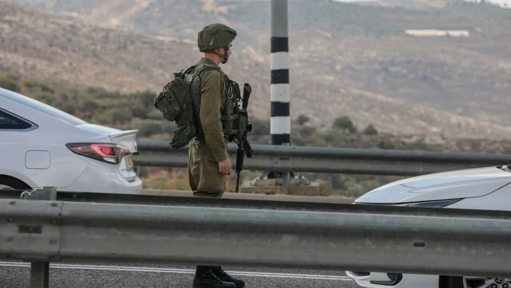 Israel Defense Forces troops at the scene of a car-ramming attack at the Maccabim Crossing near Modiin in central Israel, Nov. 2, 2022. Photo by Flash90.