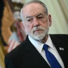 U.S. Ambassador to Israel Mike Huckabee listens during a meeting between President Donald Trump and Lebanese and Israeli envoys at the White House in Washington on April 23, 2026. Photo by Brendan Smialowski/AFP via Getty Images.