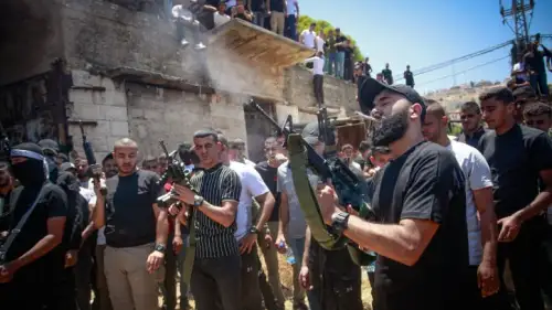 A Palestinian fires a rifle during the funeral in Jenin of terrorists killed during an IDF raid, July 5, 2023. Photo by Nasser Ishtayeh/Flash90.