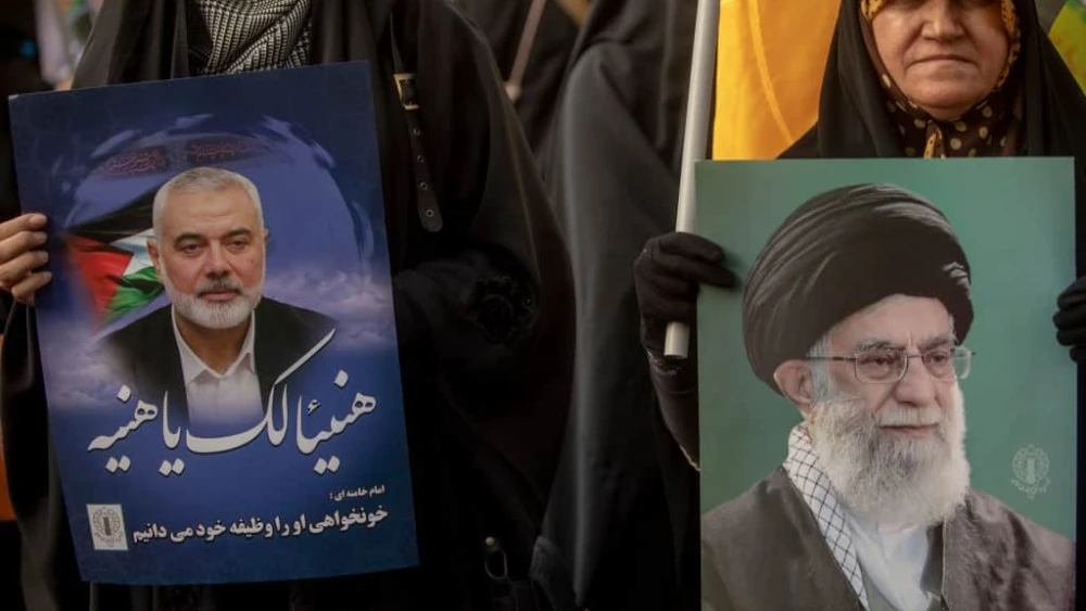 Iranians take part in a demonstration against the killing of Hamas chief Ismail Haniyeh in Tehran, July 31, 2024. Photo by Majid Saeedi/Getty Images.