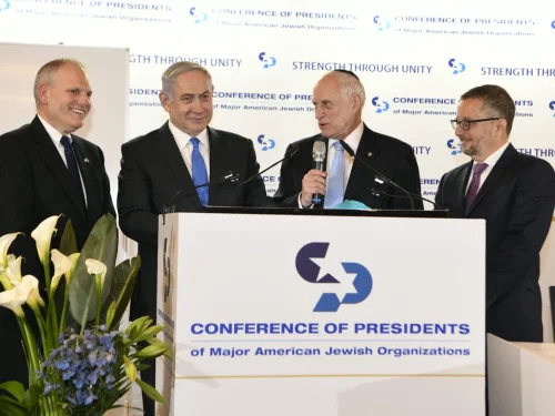 From left: Conference of Presidents CEO William Daroff, Israeli Prime Minister Benjamin Netanyahu, then-executive vice chairman Malcolm Hoenlein and then-chairman Arthur Stark speaking at the 2020 Conference of Presidents Summit in Jerusalem. Source: Conference of Presidents/X.