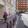 A woman walks down a street in Levallois-Perret, France, on July 30, 2024. Photo by Laure Boyer/Hans Lucas/AFP via Getty Images.