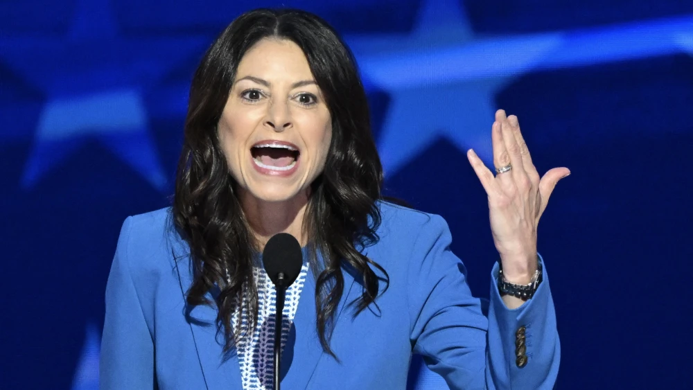 Michigan Attorney General Dana Nessel shows her wedding band as she speaks on the third day of the Democratic National Convention (DNC) at the United Center in Chicago on Aug. 21, 2024. Photo by Mandel Ngan/AFP via Getty Images.