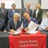 On Sept. 18 at Rutgers University in New Brunswick, N.J., Member of Knesset Erel Margalit (front, third from left) and incoming Tel-Hai College president Yossi Mekori (front, second from left) sign a memo of understanding to establish the New Jersey-Israel Healthy, Functional and Medical Foods Alliance between Rutgers and Tel-Hai. Credit: Ron Sachs.