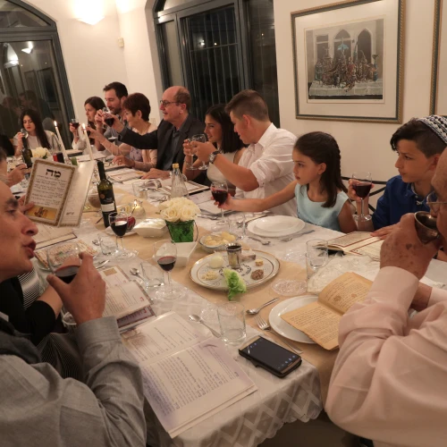 An Israeli family joins in the Passover seder last year on the first night of the Jewish holiday in Tzur Hadassah. Credit: Nati Shohat/Flash 90.