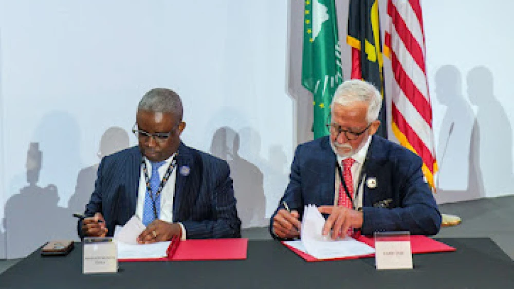 Haim Taib and Armando Manuel, chairman of Angola’s Sovereign Wealth Fund, at the signing of a $1 billion Lobito Corridor development initiative during the U.S.-Africa Business Summit in Luanda, Angola, in June 2025. Credit: Mitrelli.