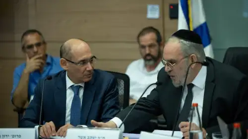 Governor of the Bank of Israel Amir Yaron (left) attends a committee meeting at the Knesset in Jerusalem, July 19, 2023. Photo by Yonatan Sindel/Flash90.