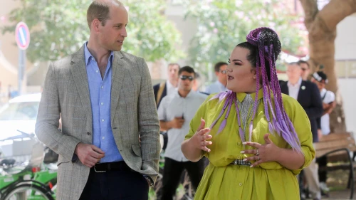 Prince William, Duke of Cambridge, walks with winner of the Eurovision 2018 song contest Netta Barzilai on Rothschild Boulevard in Tel Aviv on June 27, 2018. Photo by Marc Israel Sellem/POOL.