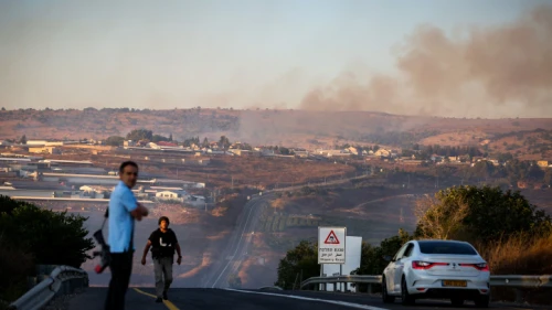 Smoke rises from a fire caused by a rocket fired from Lebanon at an Israeli military vehicle near Moshav Avivim in northern Israel, Sept. 1, 2019. Photo by David Cohen/Flash90.