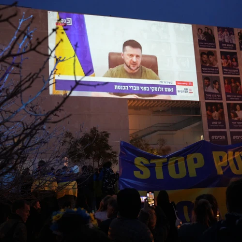 Demonstrators against the Russian invasion of Ukraine attend a televised video address by Ukraine's President Volodymyr Zelenskyy, in Tel Aviv on March 20, 2022. Photo by Chen Leopold/Flash90.