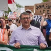 Nirav Shah, Democratic candidate for U.S. Senate, marches during a demonstration outside a federal immigration office in Scarborough, Maine, after a man was fatally shot by U.S. Immigration and Customs Enforcement (ICE) agents, July 14, 2026. Photo by Ryan Murphy/Getty Images.