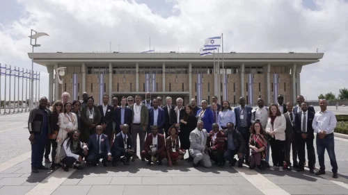 The Jerusalem Center for Public Affairs conference participants pose outside the Knesset, March 29, 2023. Source: Twitter.