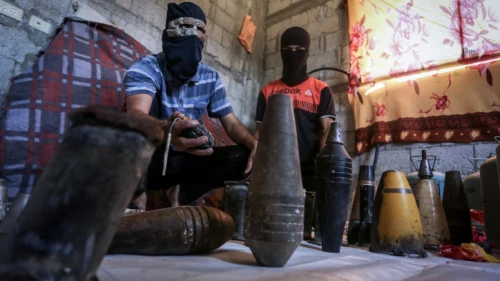 Palestinians prepare flammable materials and explosives to be attached to balloons and launched into Israel from Gaza, in Rafah, southern Gaza Strip, on Aug. 8, 2020. Photo by Abed Rahim Khatib/Flash90.