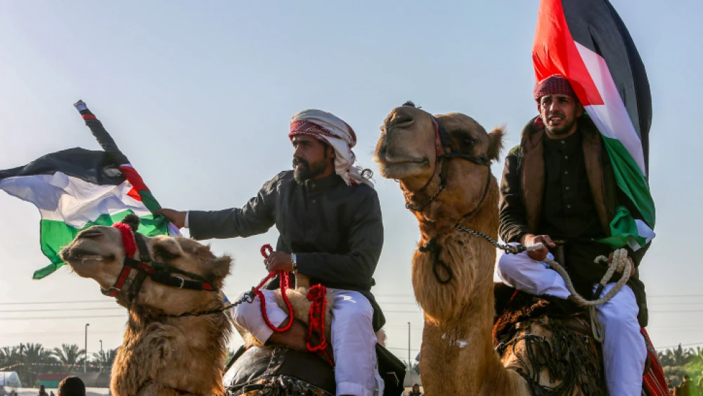 Palestinian Bedouin attend a festival to mark Land Day in Deir al-Balah camp, in the Gaza Strip, March 27, 2022. Photo by Abed Rahim Khatib/Flash90.