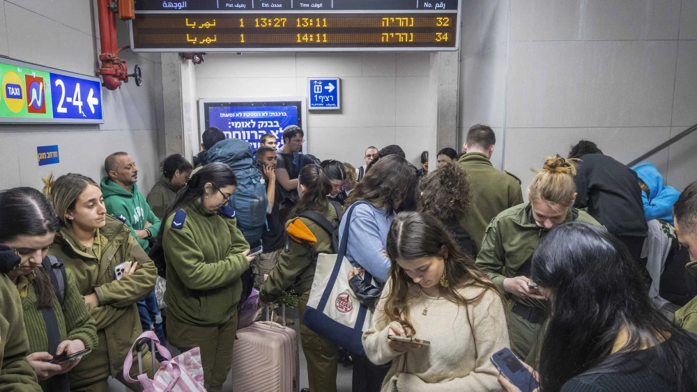 People take shelter at a train station in Haifa as a siren warns of incoming missiles, on March 10, 2026. Photo by Yossi Aloni/Flash90.