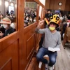 Jews read Megillat Esther (the Scroll of Esther) during Purim, at the Great Synagogue in Tel Aviv, March 16, 2022. Photo by Avshalom Sassoni/Flash90.