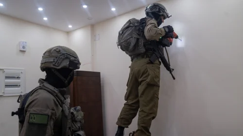 Israeli soldiers map the home in Nablus of Muad Masri, one of the Hamas terrorists who murdered three members of the Dee family, June 13, 2023. Credit: IDF.