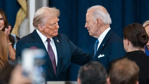 U.S. President-elect Donald Trump and U.S. President Joe Biden at Trump's inauguration in the U.S. Capitol Rotunda in Washington on Jan. 20, 2025. Photo by Kenny Holston-Pool/Getty Images.