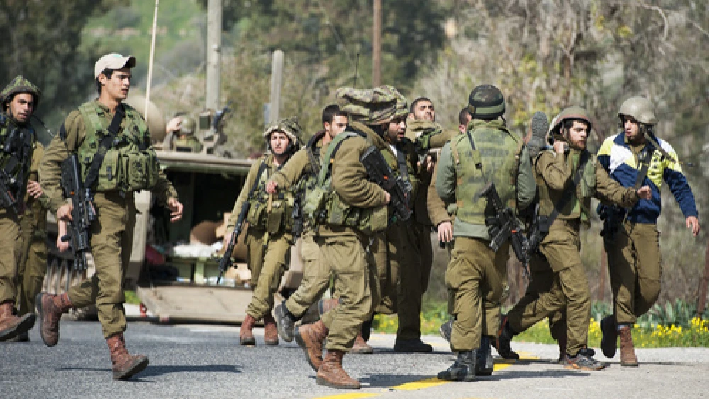 Israeli soldiers in the northern Mount Dov region after an Israel Defense Forces' patrol came under anti-tank fire from Hezbollah terrorist operatives. The Hezbollah attack killed two Israeli soldiers and injured seven others, Jan. 28, 2018. Credit: Basal Awidat/Flash90.