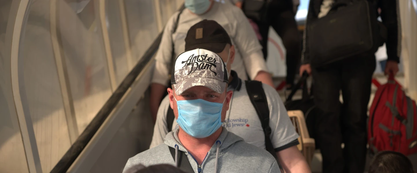 A group of new Jewish immigrants meant to arrive in Israel in March instead entered Ben-Gurion International Airport on May 20, 2020, due to delays as a result of the coronavirus. They were brought over by the International Fellowship of Christians and Jews. Photo by Arik Shraga.