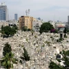A view of the Trumpeldor cemetery, built in 1902 by one of Tel Aviv’s founders, Shimon Rokach. It’s named after Yosef Trumpeldor, a Jewish Russian war hero who lived in the beginning of the 20th century. Many of the city’s founding fathers, central Zionist and cultural figures are buried here. Credit: Moshe Shai/Flash90.