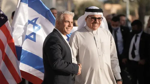 Israeli Foreign Affairs Yair Minister Yair Lapid welcomes Bahraini Foreign Minister Dr. Abdullatif bin Rashid Al Zayani to the Negev Summit, March 27, 2022. Credit: Rafi Ben Hakoon/GPO.