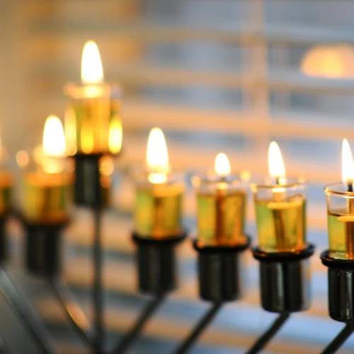 Illustration of a lit menorah on the sixth night of the Jewish holiday of Hanukkah. Photo by Mendy Hechtman/Flash90.