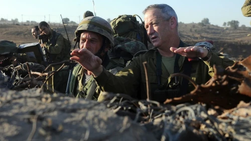Israel Defense Forces Chief of Staff Lt. Gen. Benny Gantz (right) in action during a live-fire exercise for Israeli army battalion commanders taking place in the Golan Heights on Sept. 4, 2012. Syrian tanks entered the Golan Heights demilitarized zone, raising concerns that the ongoing civil war could spill over into Israel. After Syrian tanks entered the Golan's demilitarized zone on Nov. 3, Gantz told IDF soldiers the Syrian civil war "could turn into our affair” in Israel. Credit: Shay Wagner/IDF/Flash90.
