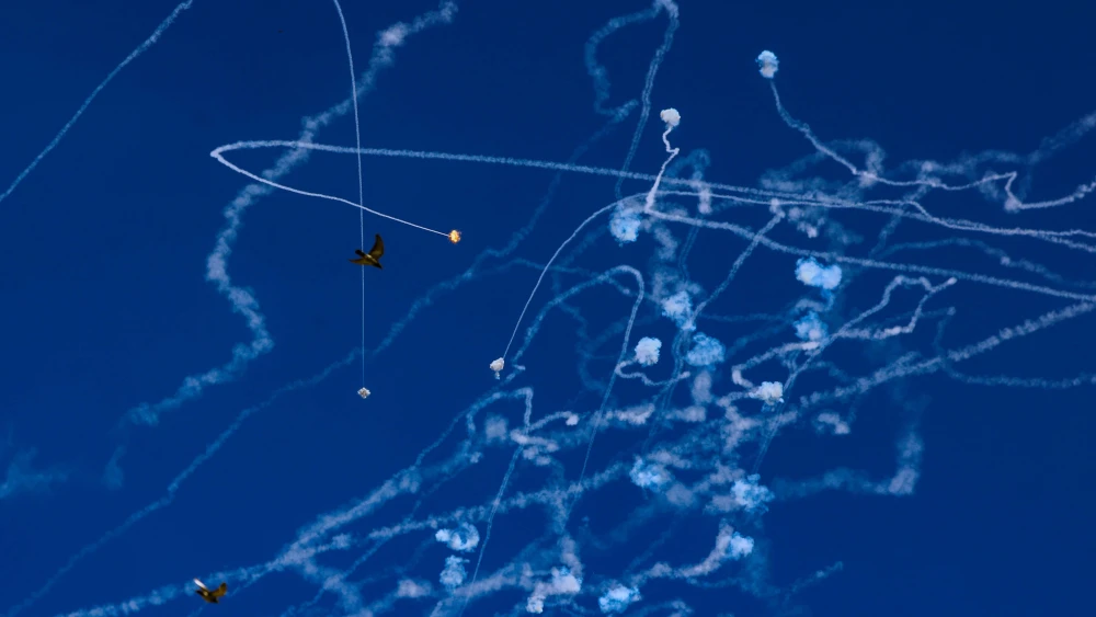 An Israeli anti missile system intercept missiles fired from Lebanon near as it seen from the northern Israeli city of Tzfat, on Sept. 25, 2024. Photo by David Cohen/Flash90.