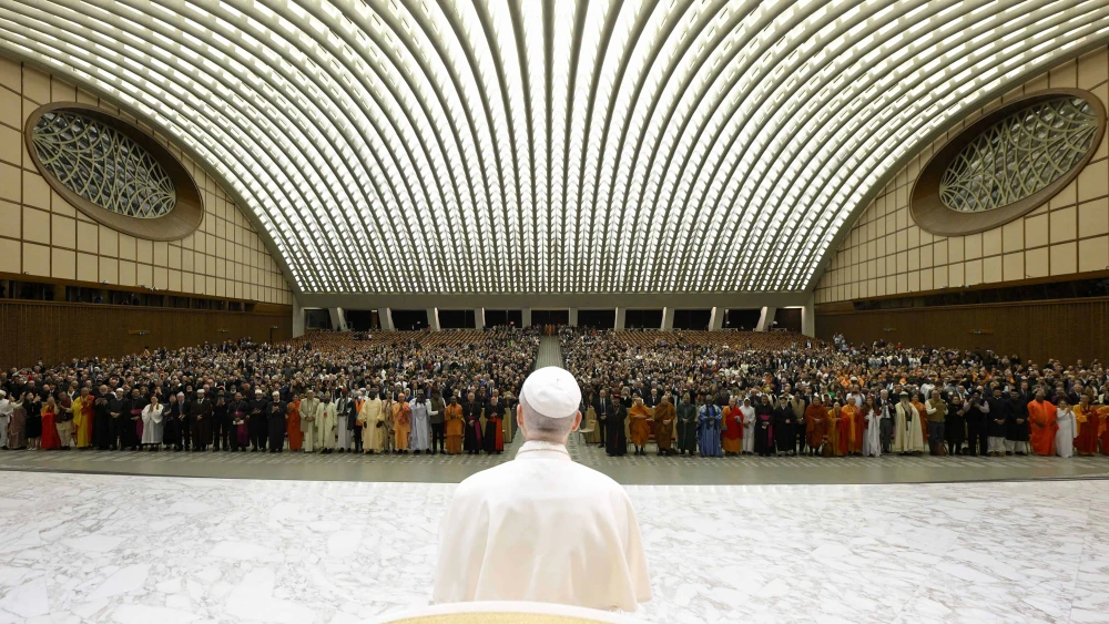 Pope Leo XIV presides at “Walking Together in Hope,” a celebration of 60 years of “Nostra Aetate,” the Second Vatican Council’s Declaration on Interreligious Dialogue at Paul VI Hall on Oct. 28, 2025 in Vatican City, Vatican. Photo by Simone Risoluti, Vatican Media via Vatican Pool/Getty Images.