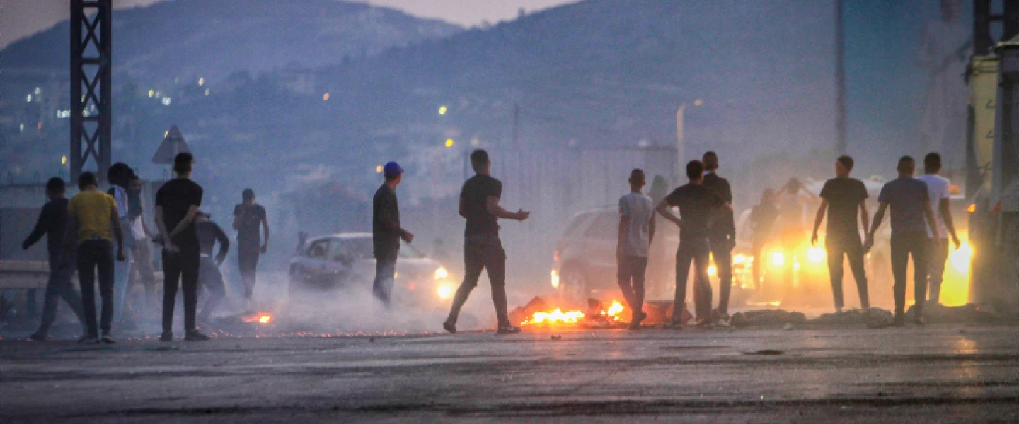 Palestinians clash with Israeli security forces at the Huwara checkpoint, south of Nablus, Oct. 14, 2022. Photo by Nasser Ishtayeh/Flash90.
