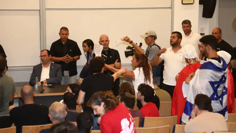 Anti-reform activists try to prevent Knesset member Simcha Rothman from speaking at Tel Aviv University, May 28, 2023. Photo by Gideon Markowitz/TPS.