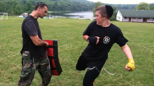 Elion Even-Esh, who served in an elite unit in the Israeli Defense Forces where he learned Krav Maga (an IDF-developed style of self-defense) and later served as a captain in the U.S. Marine Corps, has made it his mission to “instill strength and confidence” in the Torah-observant communities of the United States. Credit: Courtesy.