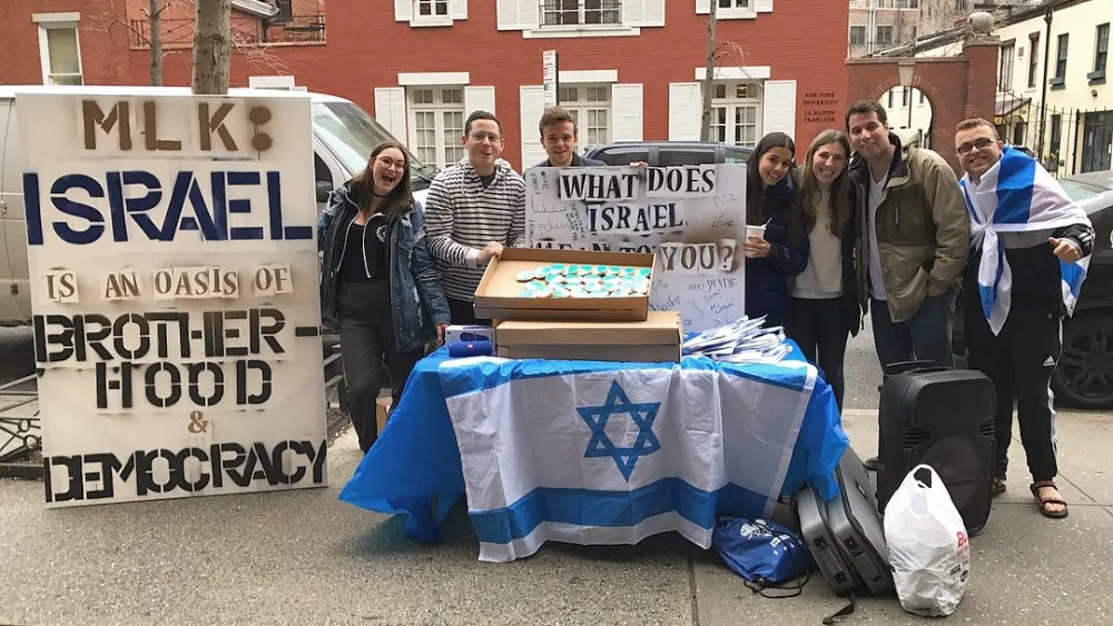 At New York University, pro-Israel students hold a counter-demonstration that raises awareness about Israeli democracy, diversity and other positive attributes of the Jewish state. Encouraging students to publicly counter anti-Israel protests is part of the Maccabee Task Force's strategy of "taking back the quad." Credit: Maccabee Task Force.