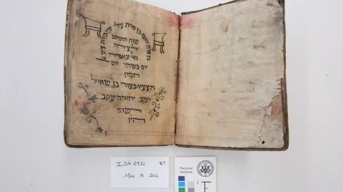 Before treatment by the National Archives and Records Administration, a Passover haggadah from 1902 recovered from the Mukhabarat, Saddam Hussein’s Intelligence Headquarters. The haggadah is part of what has become known as the Iraqi Jewish Archive. Credit: National Archives and Records Administration