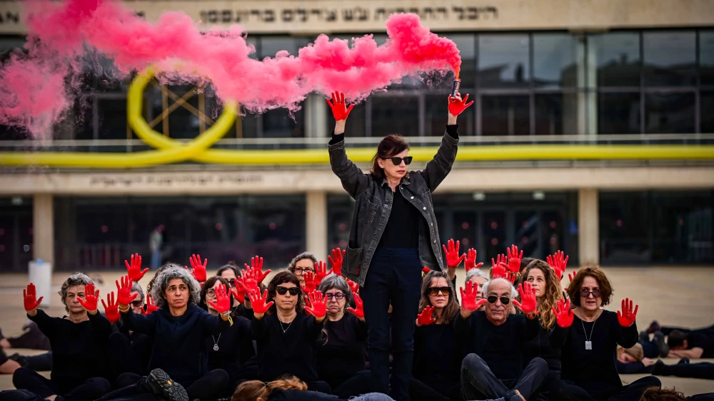 Relatives of Israelis held hostage by Hamas terrorists in Gaza take part in an installation in Tel Aviv to mark six months since the Hamas-led Oct. 7 massacre, April 7, 2024. Photo by Tomer Neuberg/Flash90.