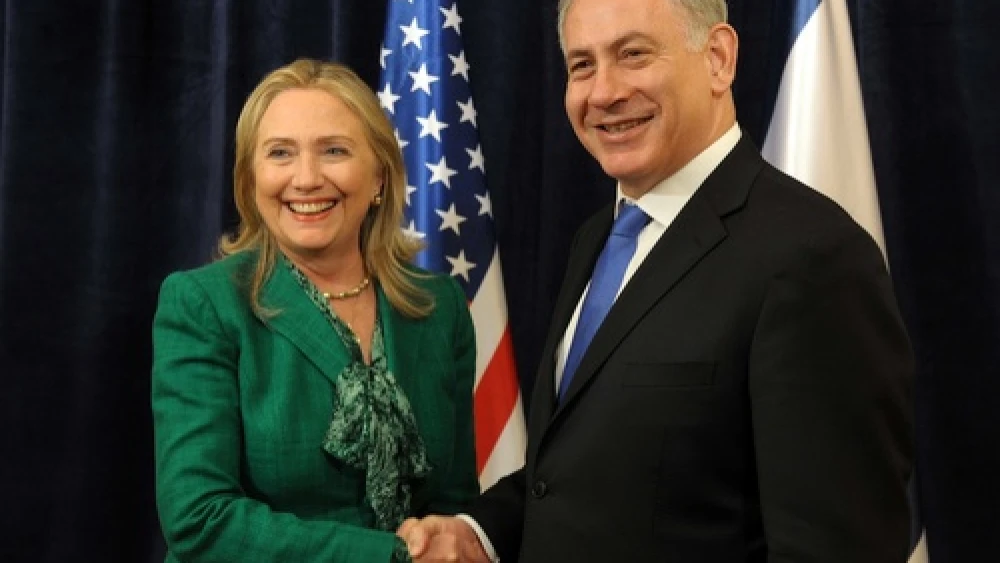 U.S. Secretary of State Hillary Clinton laughs as she meets with Israeli Prime Minister Benjamin Netanyahu (R) during an offsite bilateral meeting as part of the 67th United Nations General Assembly in New York, September 27, 2012. Credit: Avi Ohayon/GPO/Flash90.