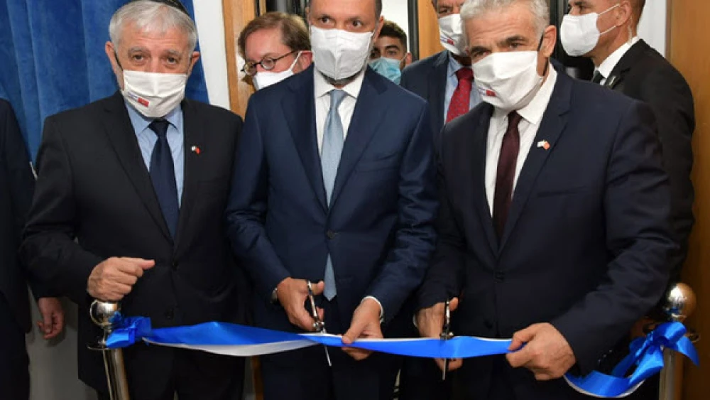 Israeli Foreign Minister Yair Lapid and Moroccan Deputy Foreign Minister Mohcine Jazouli at a ceremony heralding renewed relations between the two countries in concrete and future ways, Aug. 12, 2021. Credit: GPO/Shlomi Amsalem.