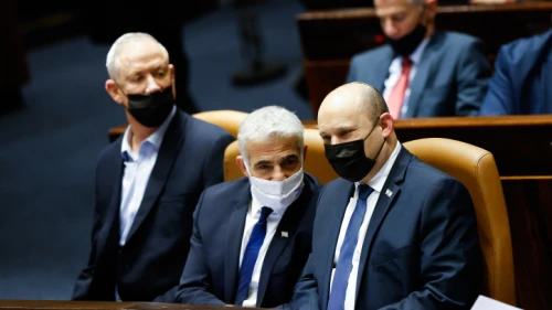 Israeli prime minister Naftali Bennett, Minister of Defense Benny Gantz and Minister of Foreign Affairs Yair Lapid attend a plenum session in the assembly hall of the Knesset, the Israeli parliament in Jerusalem on January 31, 2022. Photo by Olivier Fitoussi/Flash90