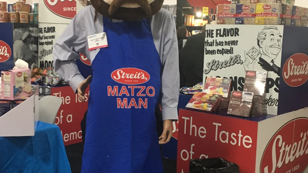 “Sam the Dancing Matzo Man”greets attendees at Photo by Credit: Faygie Holt.