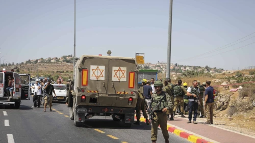 Israeli security forces at the scene of a car-ramming attack outside Elazar in the Gush Etzion region of Judea, Aug. 16, 2019. Photo by Gershon Elinson/Flash90.