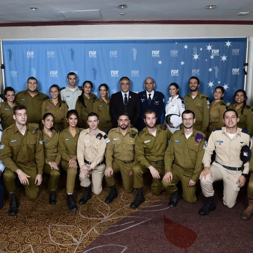 FIDF national director and CEO Maj. Gen. (Res.) Meir Klifi-Amir; Brig. Gen. Tal Kelman, head of the Strategic Division of the IDF Planning Directorate and former Chief of Staff in the Israeli Air Force (IAF); with Israeli soldiers at the 2018 FIDF National New York Gala Dinner on Oct. 17, 2018. Credit: Shahar Azran.