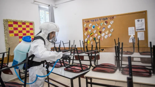 A classroom at the Gymnasia high school in Jerusalem being disinfected on June 3, 2020. Photo by Yonatan Sindel/Flash90.