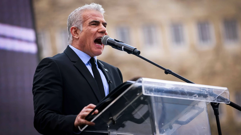 Israeli opposition leader Yair Lapid (Yesh Atid Party) at a protest outside the Israeli parliament in Jerusalem March 27, 2023. Photo by Erik Marmor/Flash90.