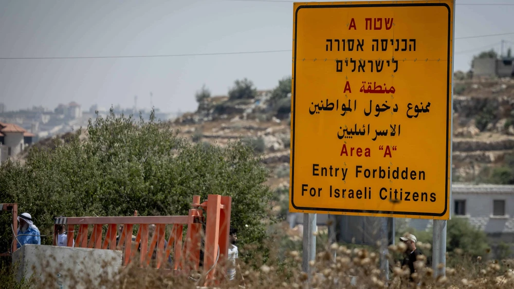 A sign on Route 60 near Hebron in Judea warning Israelis against entering Area A, which is under control of the Palestinian Authority, Aug. 21, 2023. Photo by Chaim Goldberg/Flash90.