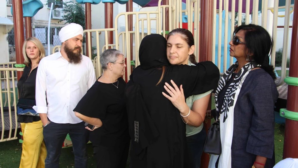 The American Muslim leaders meet in Sderot with Meirav Barkai of Kibbutz Be'eri, whose 81-year-old mother and 20-year-old nephew were murdered in the Hamas attack on Oct. 7. Photo by Yoav Lin.