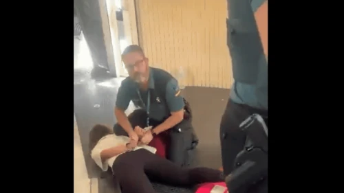 A Spanish police officer arrests a Jewish camp counselor in Valencia on July 23, 2025. Source: i24 News/screenshot.