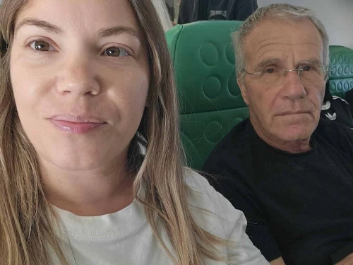 Israelis Lilach and her father on the flight from Larnaca to Aqaba. Credit: Courtesy.