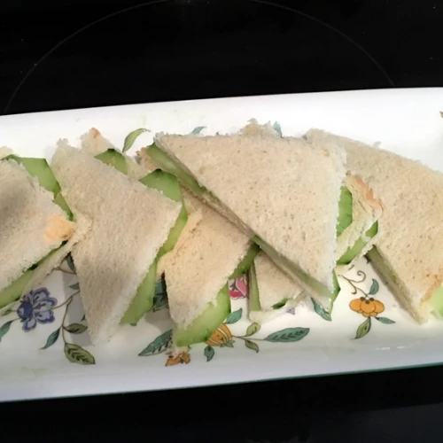 Take out your best trays for winter tea and fill them up with dainty delights, like these Cucumber Sandwiches. Credit: Ethel G. Hofman.